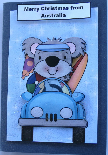 Koala Bear Driving to the Beach by Wynona Oneil