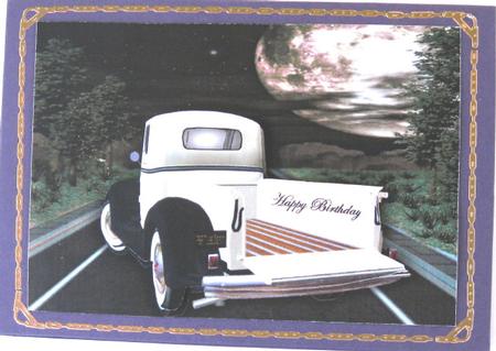 Truck on the Road with the Moon Background by Wynona Oneil