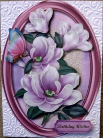 Beautiful Deep Magnolias in a Oval Frame  by Wynona Oneil