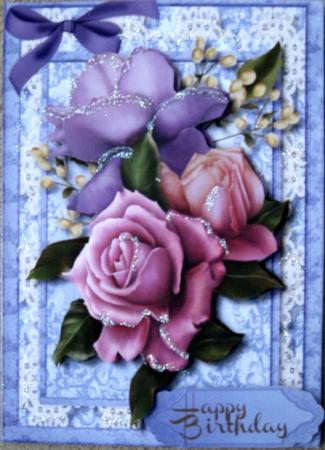 Beautiful Mixed Roses on Baby's Breath and Lace  by Wynona Oneil