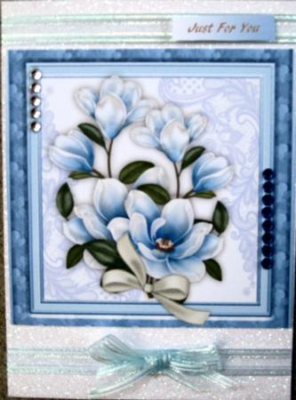 Lovely Blue Magnolias on Lace  by Wynona Oneil