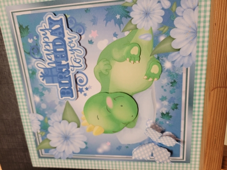 Cute little snuggle snooze dino with flowers 8x8 by Yana Pritchard