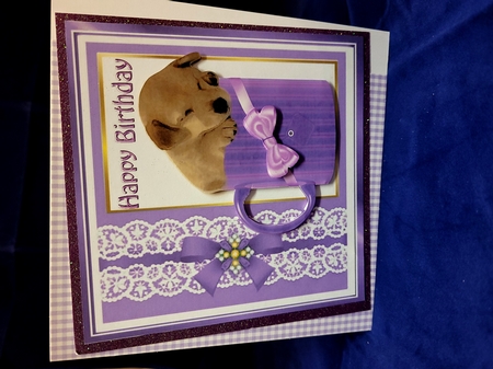 Cute little puppy sleeping in a mug with purple bow 8x8 by Yana Pritchard