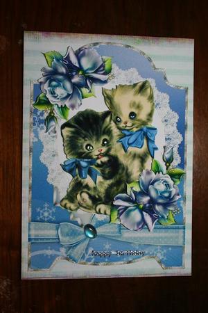 Vintage Kitties with Blue Roses on Lace with Bow by Yvette Koppens