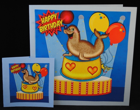 Clever seal playing with balls in the circus 8x8 by Yvonne Middleton