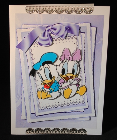 Cute pair of ducks with big bow on lace card front A4 by Yvonne Middleton