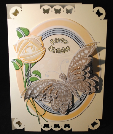 Beige butterfly with graduated layers by Yvonne Middleton