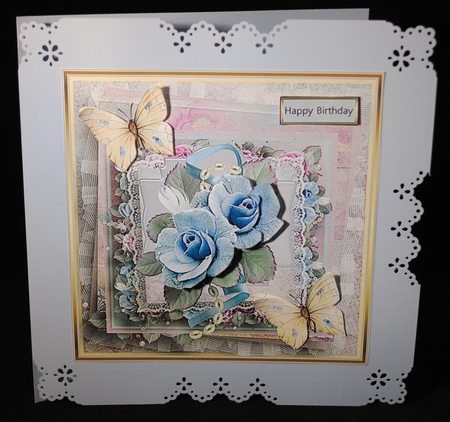 Blue rose and butterfly by Yvonne Middleton