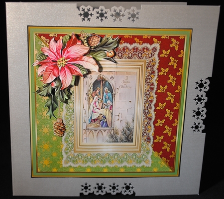 The nativity and poinsettia by Yvonne Middleton