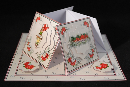 Merry Christmas quad easel card with fancy shaped pyramage. by Yvonne Middleton