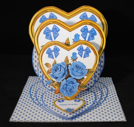 Gold triple heart easel card with blue roses and matching envelope. by Yvonne Middleton