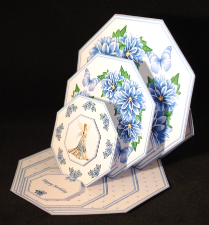 Blue daliahs and fairy octagonal triple easel card with matching envelope. by Yvonne Middleton