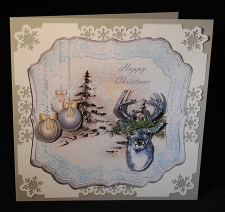 Christmas Deer in Blue and Silver Frame with Baubles and Snow by Yvonne Middleton