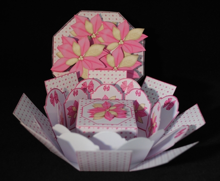 Pink poinsettia octagonal exploding box card with gift box. by Yvonne Middleton