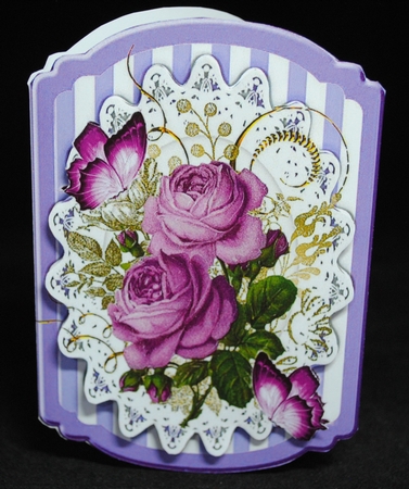 Beautiful spray of purple flowers on lace bracket card by Yvonne Middleton
