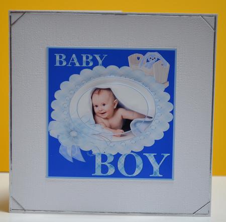 Baby Boy Under Blanket Oval Pyramid by Yvonne Middleton
