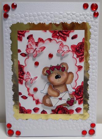 Cute Teddy Bear with Dark Red Roses by Yvonne Middleton