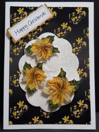 Embossed Holly Flourishes in Black and Gold by Yvonne Middleton