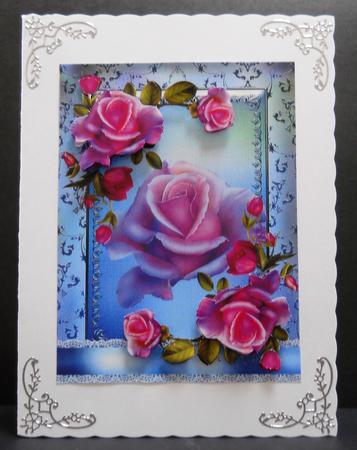 Gorgeous Roses in a Shimmer Blue Frame by Yvonne Middleton
