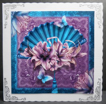 Alluring Teal Fan with Purple Lily's Topper by Yvonne Middleton