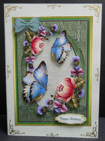 Blue Butterflys on a Pale Green Frame by Yvonne Middleton
