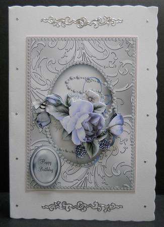 Delicate Rose in a Silver Shimmering Pearl Frame by Yvonne Middleton