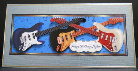 2 Nephew Guitar Toppers by Yvonne Middleton