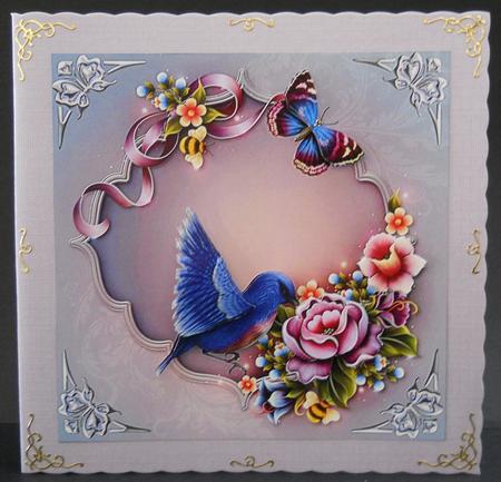 Blue Bird Feeding Time by Yvonne Middleton