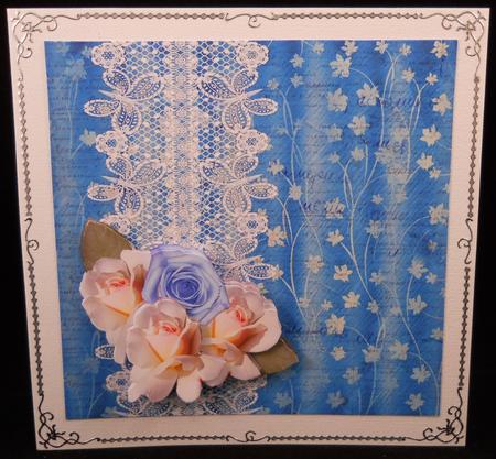 White and Blue Roses by Yvonne Middleton