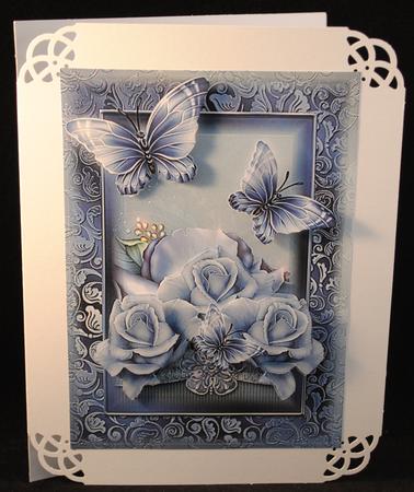 Beautiful Blue Roses and Butterfly Card Front by Yvonne Middleton