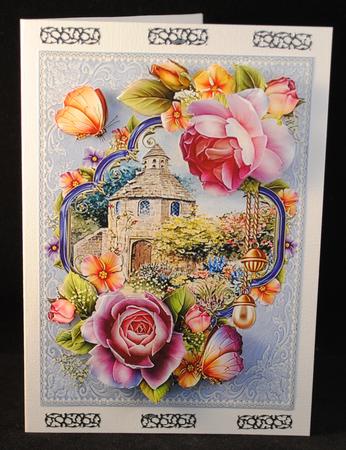 English Roses and Butterflies at Dovecote Cottage by Yvonne Middleton