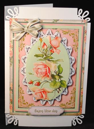 Lovely Salmon Pink Roses on Battenburge Lace  by Yvonne Middleton