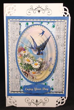 Bluebirds and Daisys, ( Pyramid ) by Yvonne Middleton