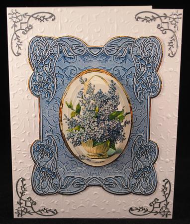 For-get-me-nots in a Scroll Frame Pyramid by Yvonne Middleton