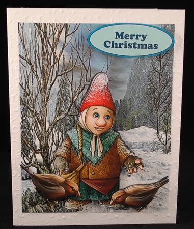 Gnome Feeding the Birds in the Snow by Yvonne Middleton