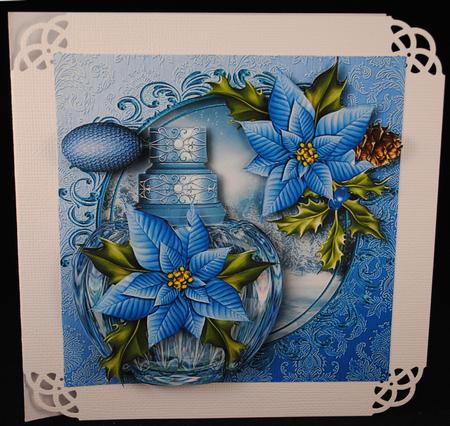 Christmas Perfume Bottle - the Scent of Blue Poinsettias by Yvonne Middleton