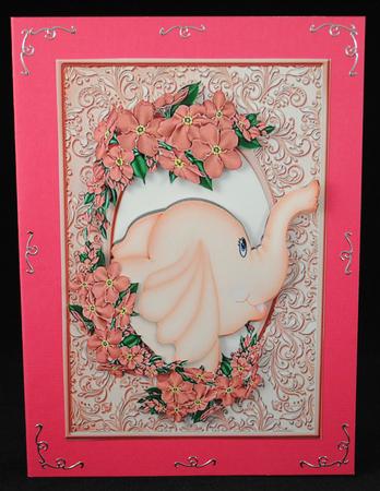 Pink Elephant in Frame of Flowers by Yvonne Middleton