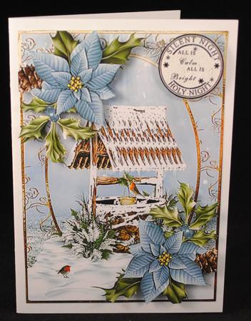 Snowy Wishing Well with Blue Poinsettias by Yvonne Middleton