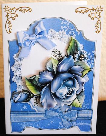 Pretty Blue Roses on Lace with Bow by Yvonne Middleton