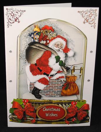 Lovely Snow Globe with Sants Going Down the Chimney by Yvonne Middleton