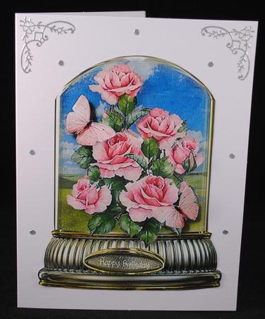 Beautiful Roses and Butterflies in a Globe by Yvonne Middleton