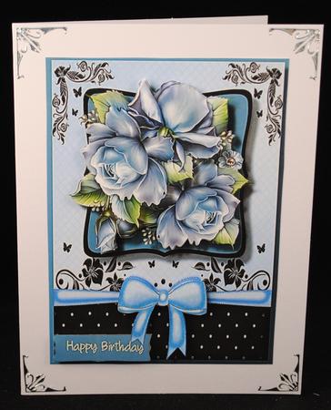 Lovely Blue Roses on Blue and Black Bracket by Yvonne Middleton