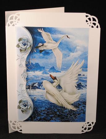 Beautiful Fantasy Swans with the Ocean, and Blue Roses by Yvonne Middleton