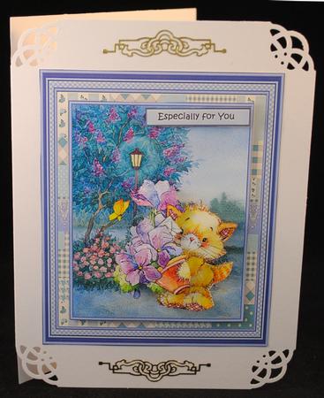 Kitten and Flowers by Yvonne Middleton