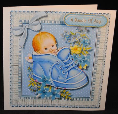 A Bundle of Joy in a Bootie ( Boy) by Yvonne Middleton