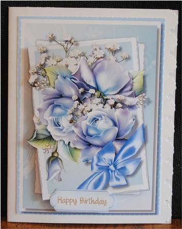 Beautiful Blue Roses and Baby's Breath by Yvonne Middleton