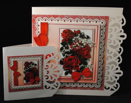 Beautiful Red Roses and Ribbon Bow on Lace  by Yvonne Middleton