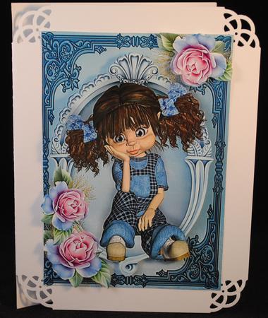 Little Kiki Girl with Blue Frosted Roses A4 by Yvonne Middleton