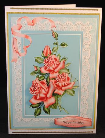Lovely Pink Roses on Turquoise Background by Yvonne Middleton