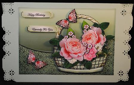Basket with Roses by Yvonne Middleton